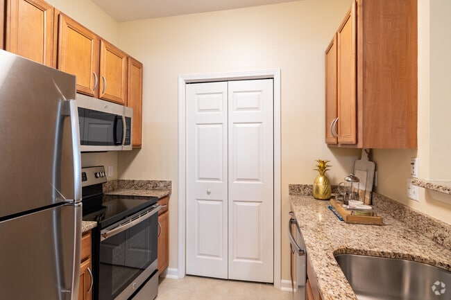 1BR, 1BA-740SF-Kitchen - Residences at Highland Glen - 55+ Active Adult Community