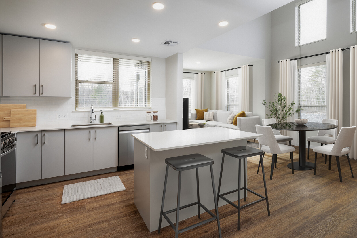 Kitchen with stainless steel appliances, white quartz countertop, light grey cabinetry, and hard surface flooring - Kanso Milford