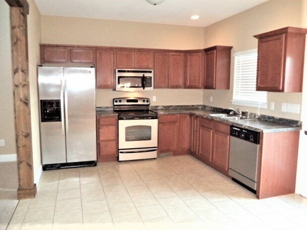 Foto del edificio - 6855 Harvest Grove Lane