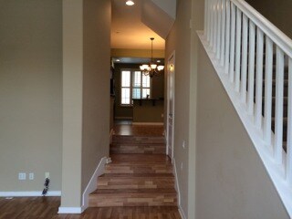 Stairs from living space into dining room - 5511 W 149th Pl
