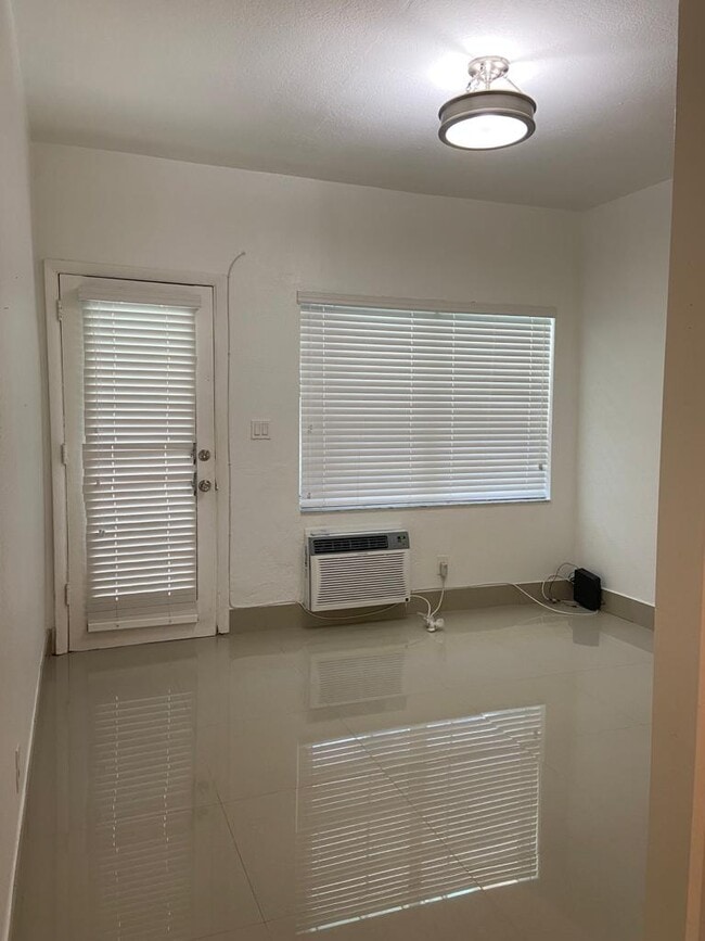 Building Photo - 6498 Collins Ave