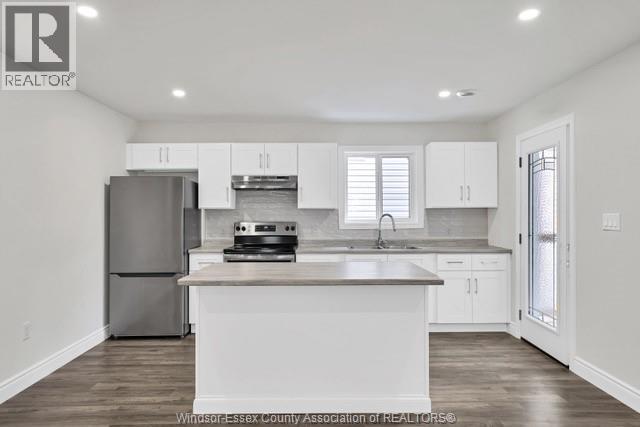 Building Photo - 651-655 STANLEY Unit# 1-4