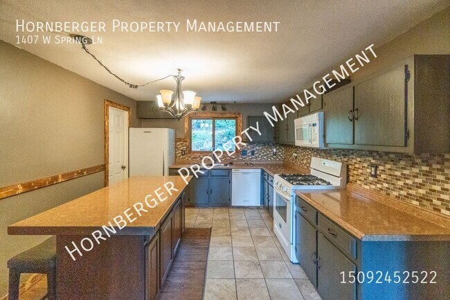 Foto del edificio - 1407 W Spring Ln