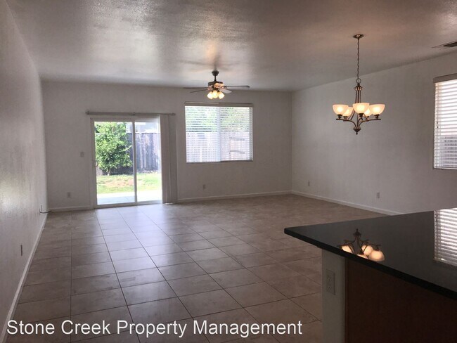 Building Photo - 4 br, 2 bath House - 12345 Canyonlands Dr.