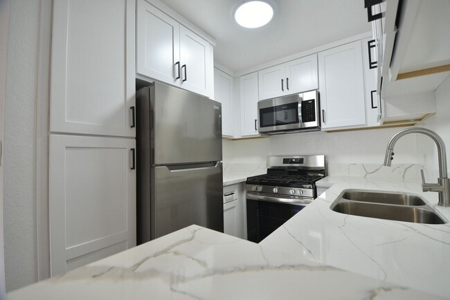 Building Photo - 7032 Remmet Ave