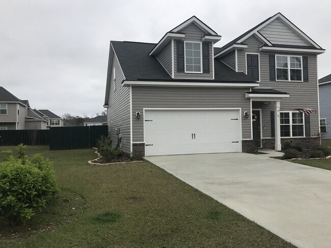 Building Photo - 4 Bedroom/ 2.5 Bath- Fenced in Back Yard