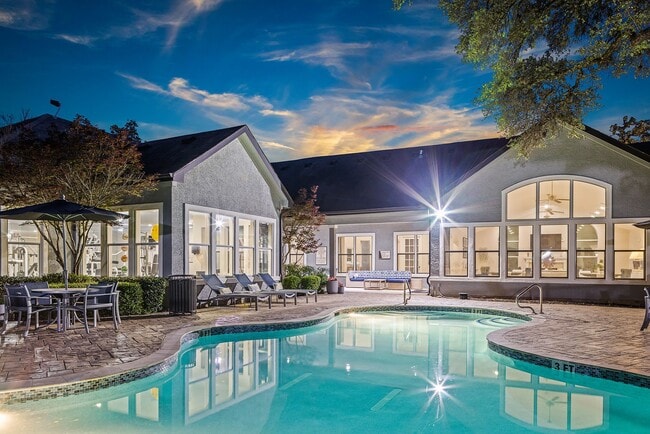 Resort style pool with lounge seating. - Marquis at TPC