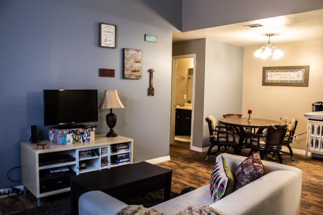 FW 2x2 Living Room Furnished - Upstairs - Taliesin Apartments