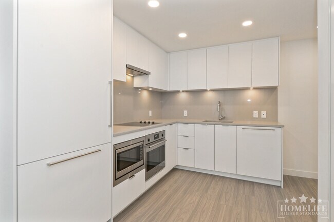 Building Photo - Welcome to Flamingo One, a landmark tower in Surrey Central!