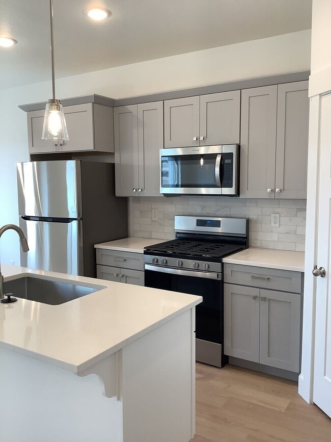 Building Photo - $750 OFF FIRST MONTH"S RENT -New Construct...