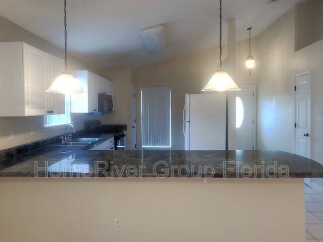 Building Photo - 7077 Weatherwood Dr