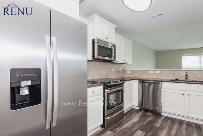 Building Photo - This Summer Special is Heating Up!: 50% of...