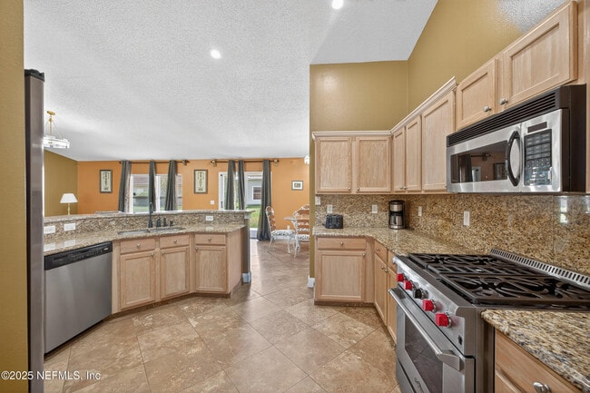 Foto del edificio - 10375 Woodley Creek Blvd