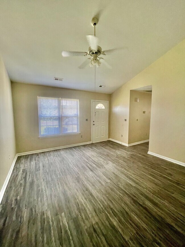 Building Photo - This lovely three bedroom two bath home