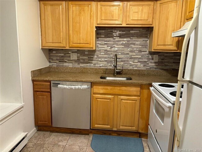 Foto del edificio - 32 Candlewood Dr