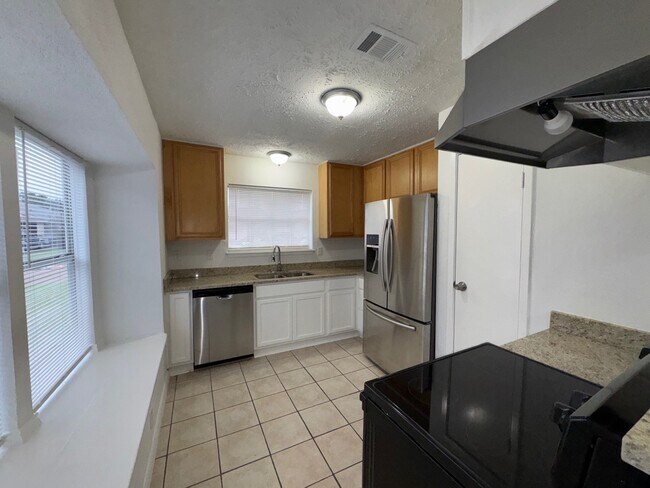 Building Photo - 10044 Woodico Dr