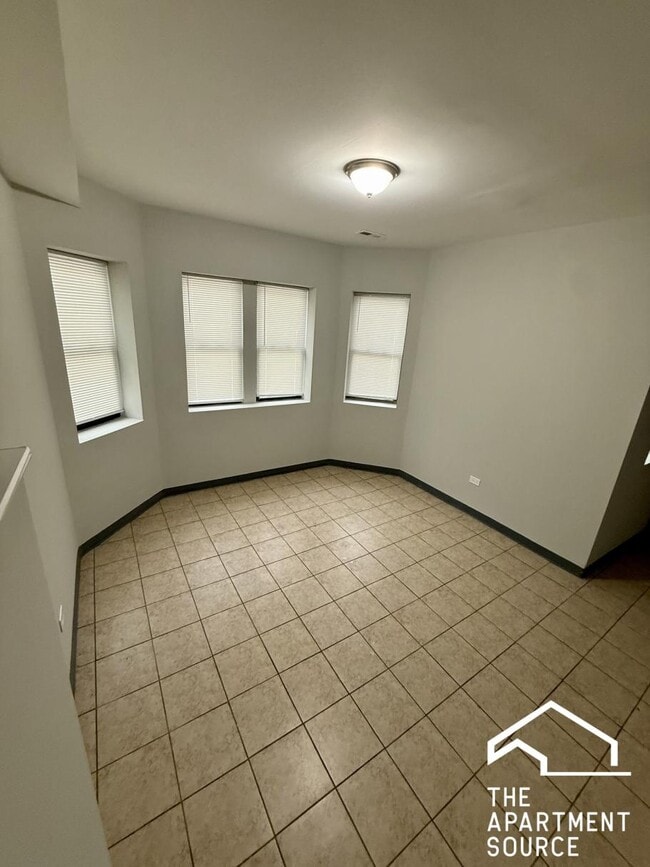 Building Photo - 6917 S Paxton Ave