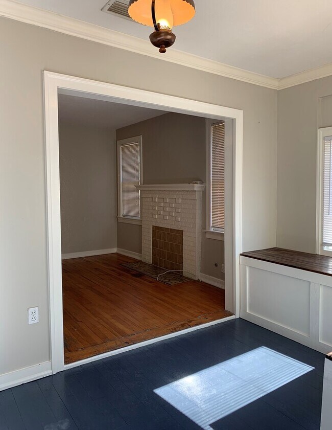 Building Photo - Charming Corner Lot Home with Huge Fenced Yard with Detached Garage