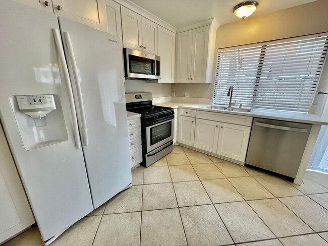 Building Photo - Discover the Essence of Irvine Living!