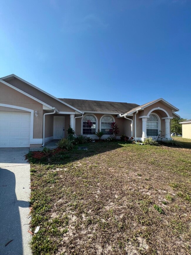 Building Photo - 4251 SW Astro Ct