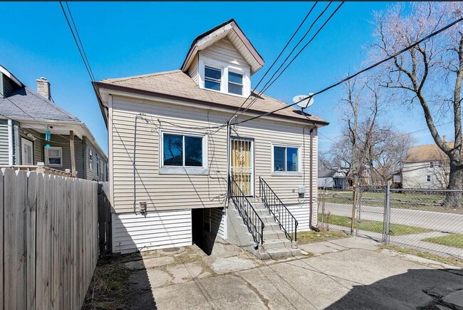 Building Photo - 1301 W 71st Pl