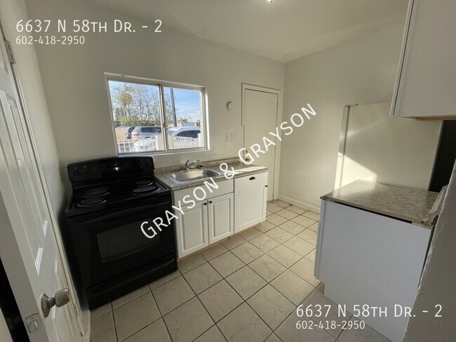 Foto del edificio - 6637 N 58th Dr