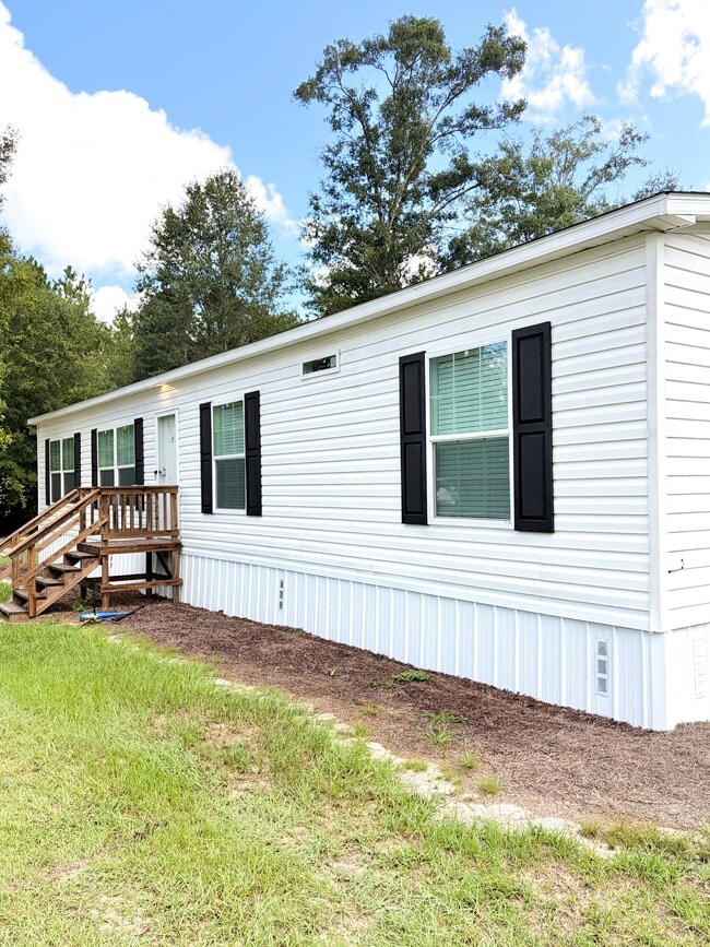 Building Photo - 5250 Hummingbird Ln
