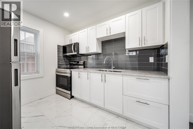 Building Photo - 1691 Dougall Ave