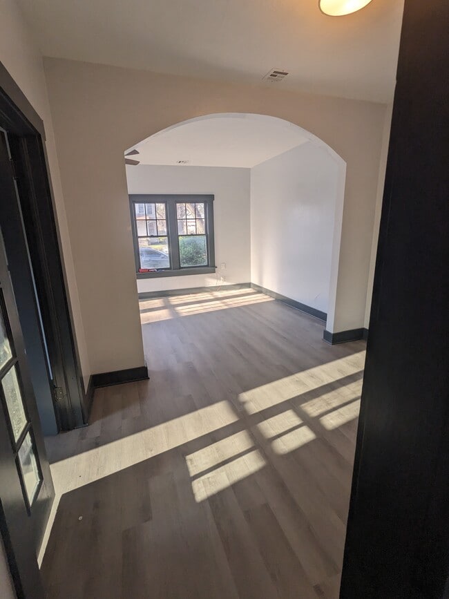 Dining Room opening into Living Room - 213 W 10th Ave