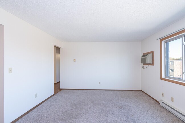 Apartamentos en Hartford, Fargo, ND | 11A | Sala de estar - Hartford