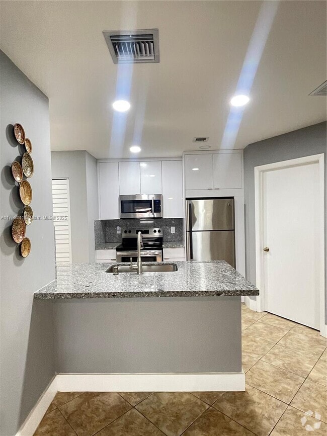 Building Photo - 18310 NW 68th Ave