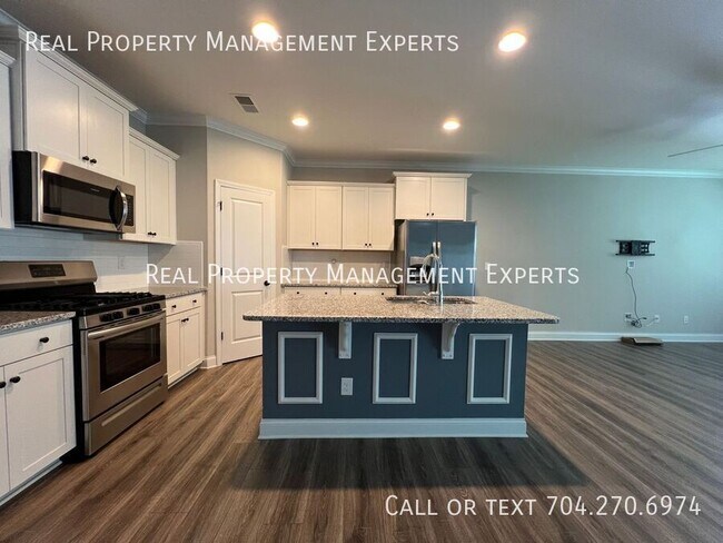 Foto del edificio - 5040 Harris Woods Blvd