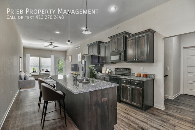 Building Photo - Reserve Townhome - Available May 17th