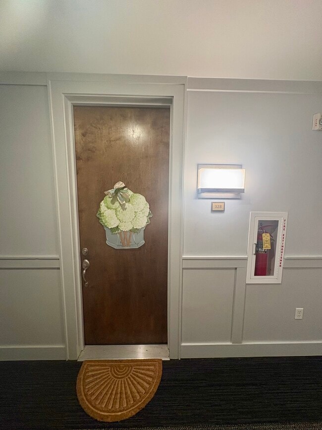 Front door with enclosed hallway with A/C and heat - 200 Manufacturers Rd