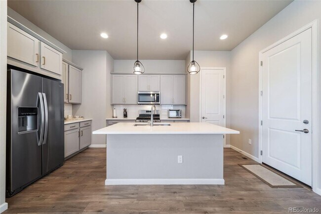 Building Photo - New ranch style home with a finished basem...