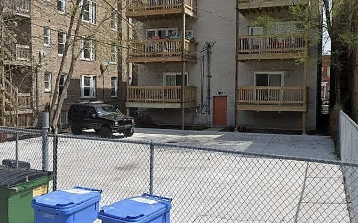 Enclosed parking with remote gate opener, back deck (upper left) - 4346 S Lake Park Ave