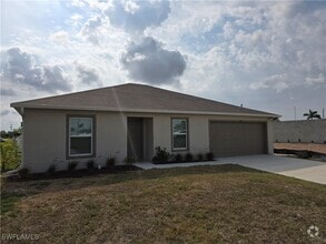 Building Photo - 120 NW 25th Ave