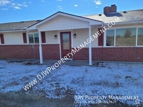 Building Photo - 5200 S Black Cat Rd