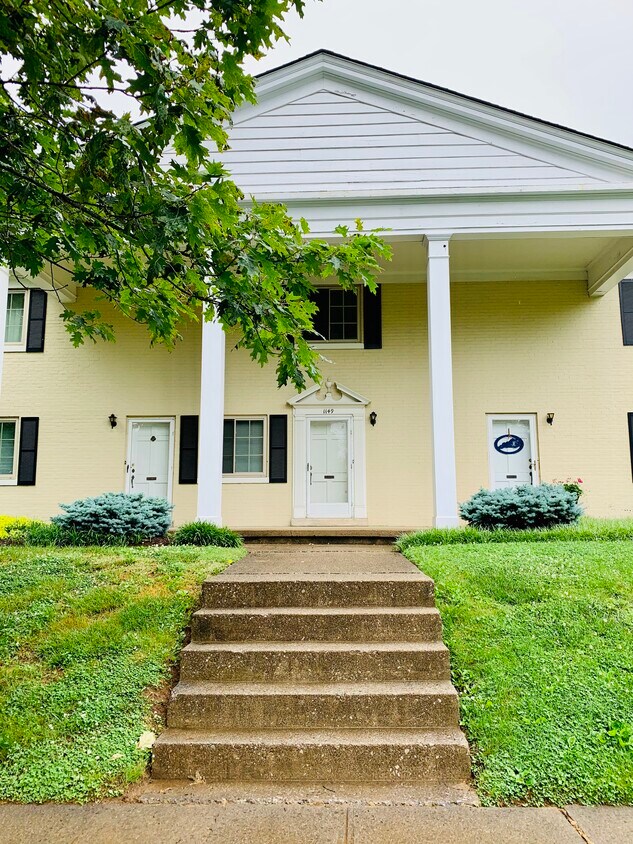 Townhouse is the center unit of the building, with the decorative door - 1149 Cooper Dr