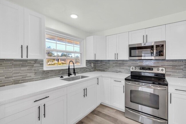 Foto del edificio - 456 Sandlewood Dr