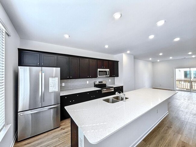 Building Photo - Modern Comfort Meets Convenient Living: Sp...