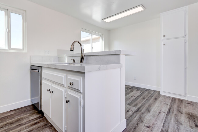 Kitchen counter, new dishwasher and bar area - 2312 Grant Ave