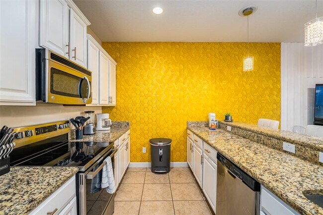 Building Photo - 8879 Candy Palm Rd