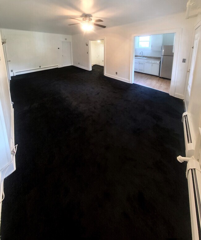 New Carpet in a wide living/dining room w/plenty of natural - 3 Cedar St