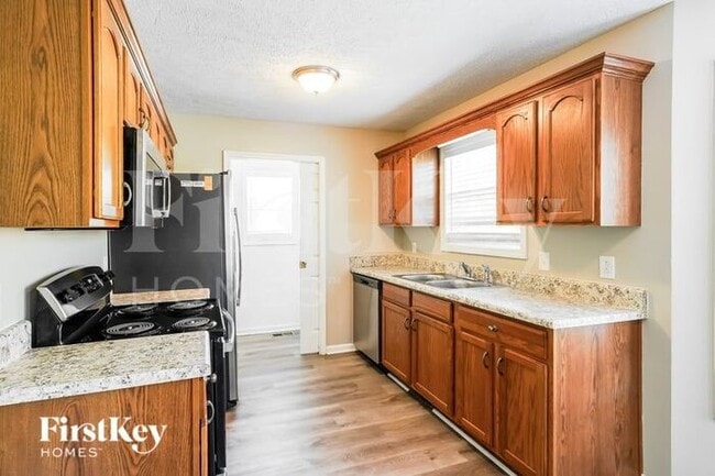 Building Photo - 6009 Pleasant Hill Dr