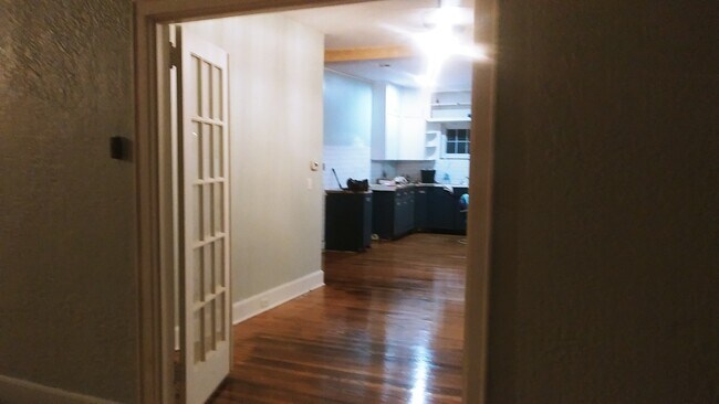 Open kitchen /family room newly refinished oak floors - 200 N Chilhowee Dr