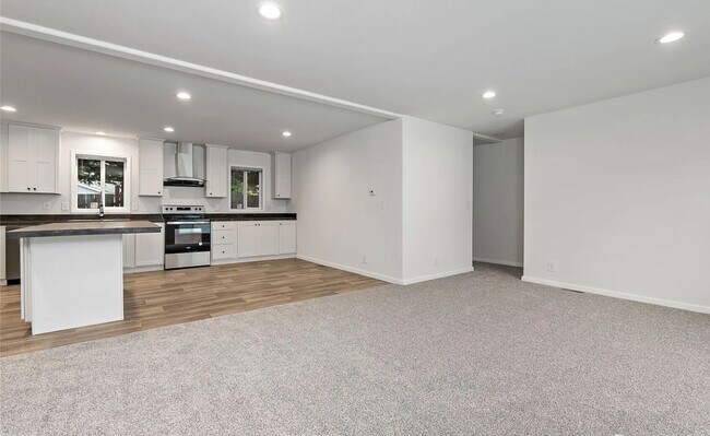 Building Photo - Your Cozy, Updated Rambler Retreat Awaits!