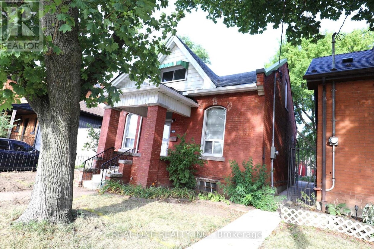 Photo principale - 148 Victoria Ave N