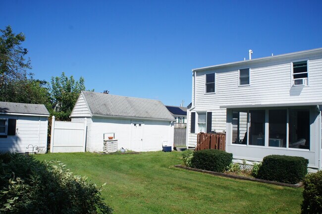 Back of house looking at garage - 8 Halsey Ave