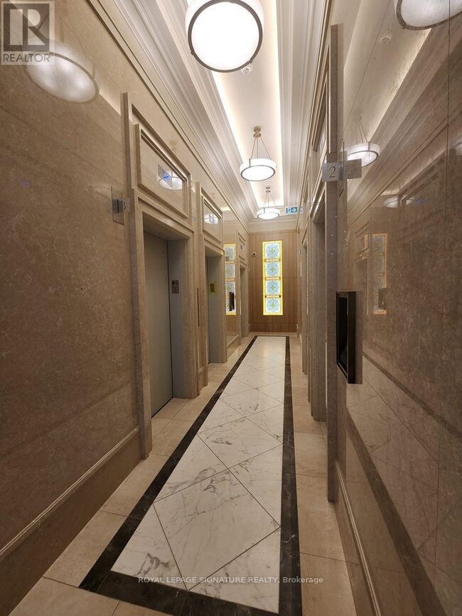 Photo du bâtiment - 36 Elm Dr W